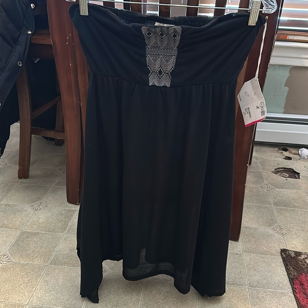Bathing suit cover up.  Brand new, never worn. sz XL but it looks like medium.